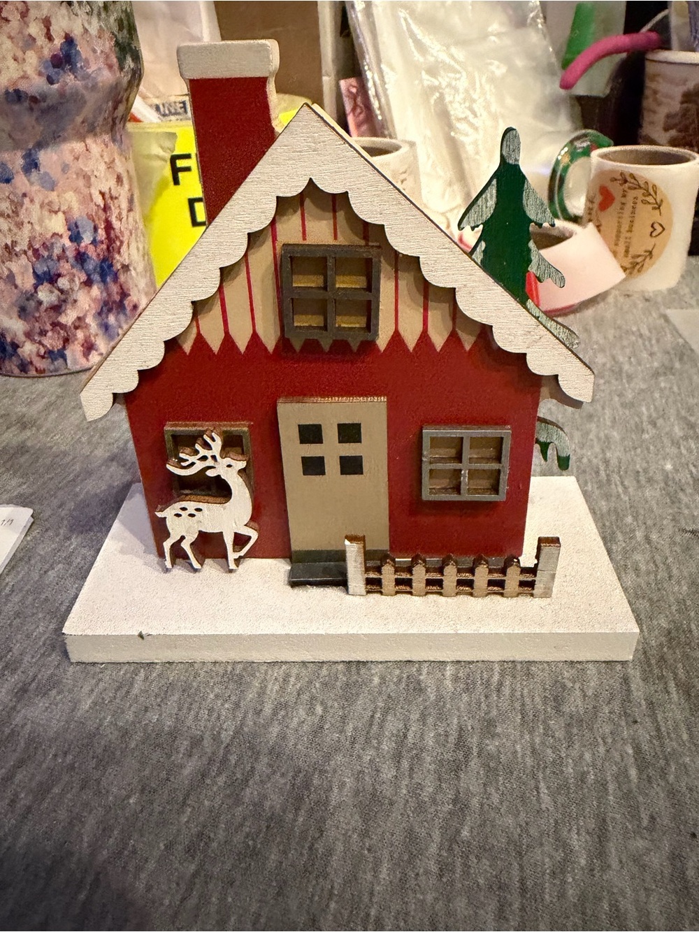 Festive Red Wooden Holiday House Decor with White Trim